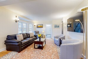 TV, fireplace, books - Historic, dog-friendly beach view house with fast WiFi, ocean view, & grill (Oak Bluffs)