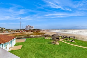 Terrace/patio - Seascape resort condo with ocean-view balcony, WiFi, AC, pool, & hot tub (Galveston)