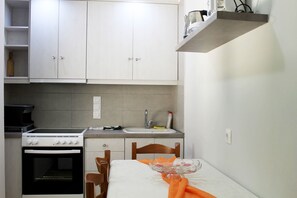 Fridge, oven, electric kettle, toaster