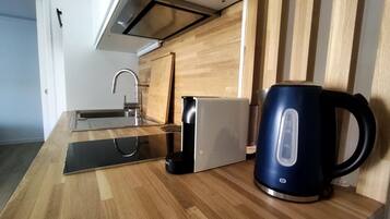 Geladeira, micro-ondas, lava-louças, cafeteira/chaleira