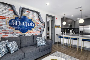 TV - Muse | Rockstar downtown condo with private balcony, central AC & gym (Nashville)