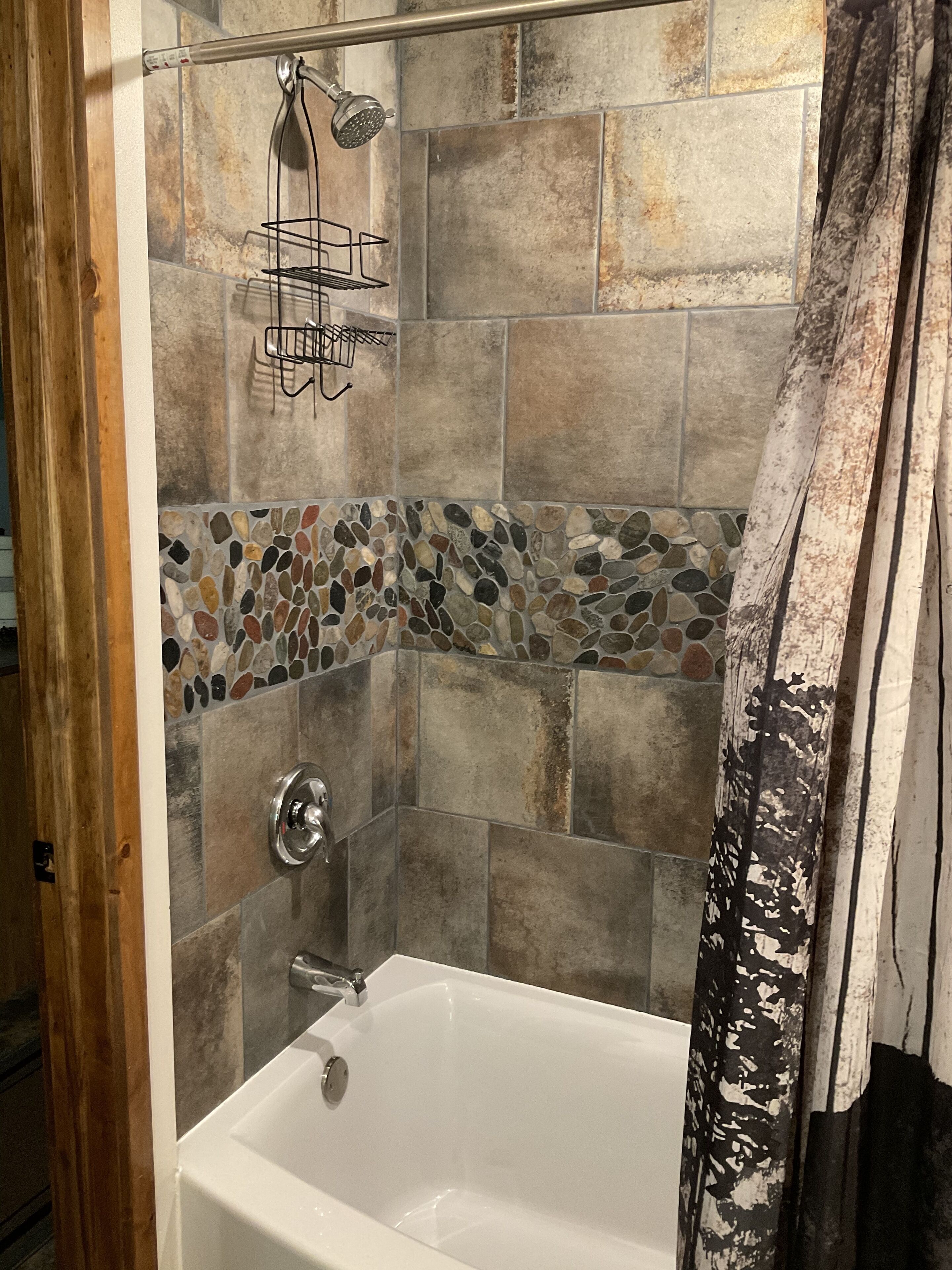 Combined shower/bathtub, hair dryer, towels, soap