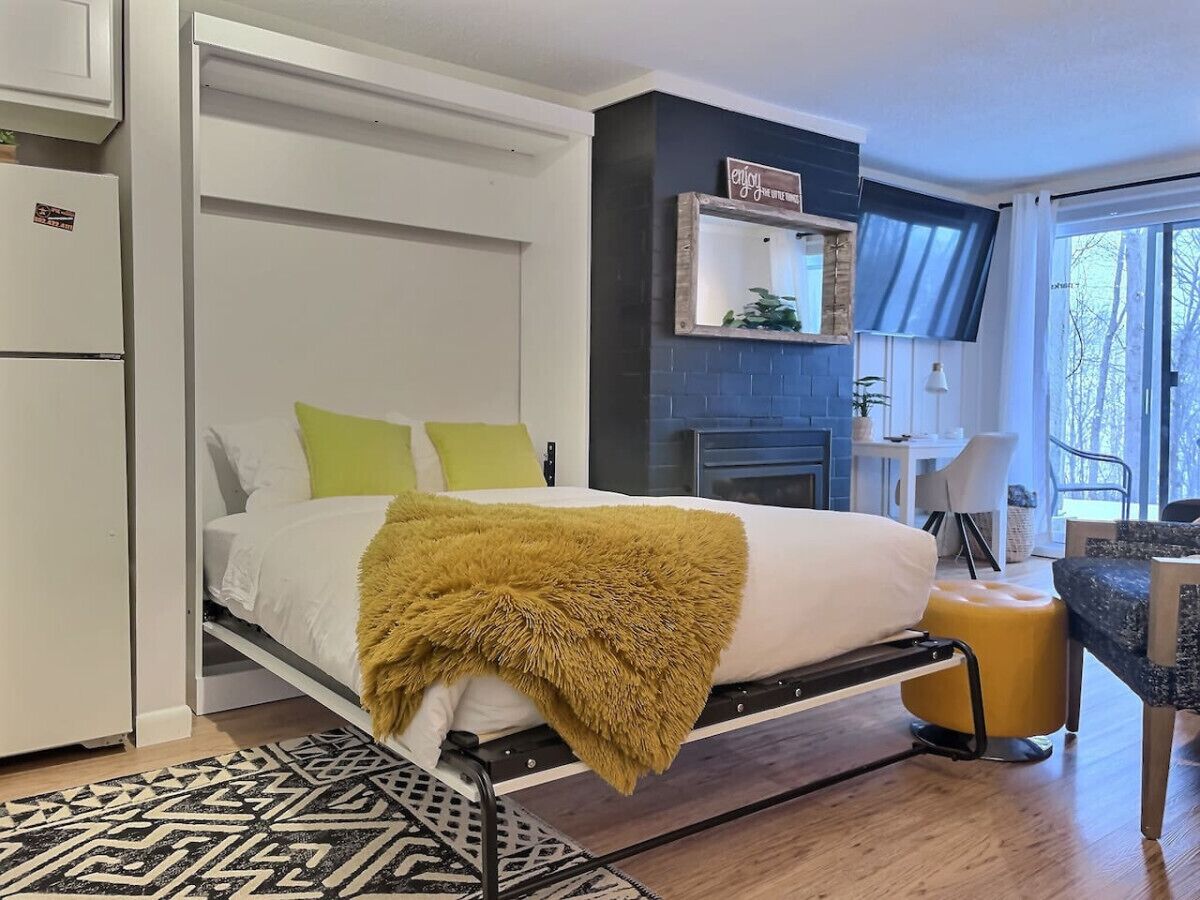 1 bedroom, desk, iron/ironing board, travel crib