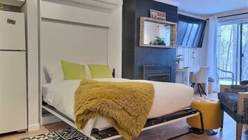 1 bedroom, desk, iron/ironing board, travel crib