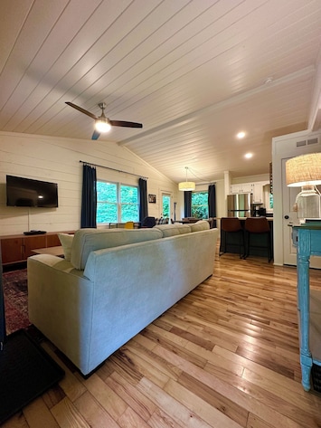 Entry from the deck, living and dining rooms.