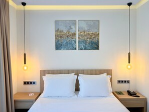 Premium bedding, minibar, in-room safe, desk