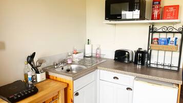 Vorlich Lodge | Private kitchenette | Fridge, microwave, oven, stovetop