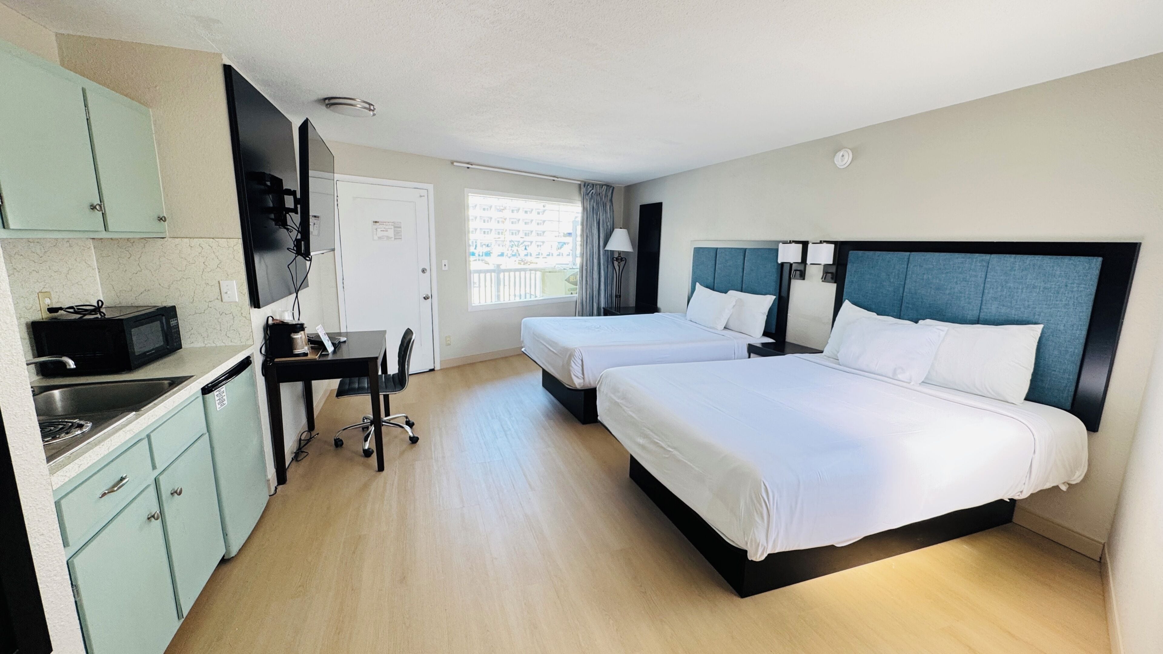 Basic Single Room, 2 Queen Beds, Kitchenette | Free WiFi, bed sheets