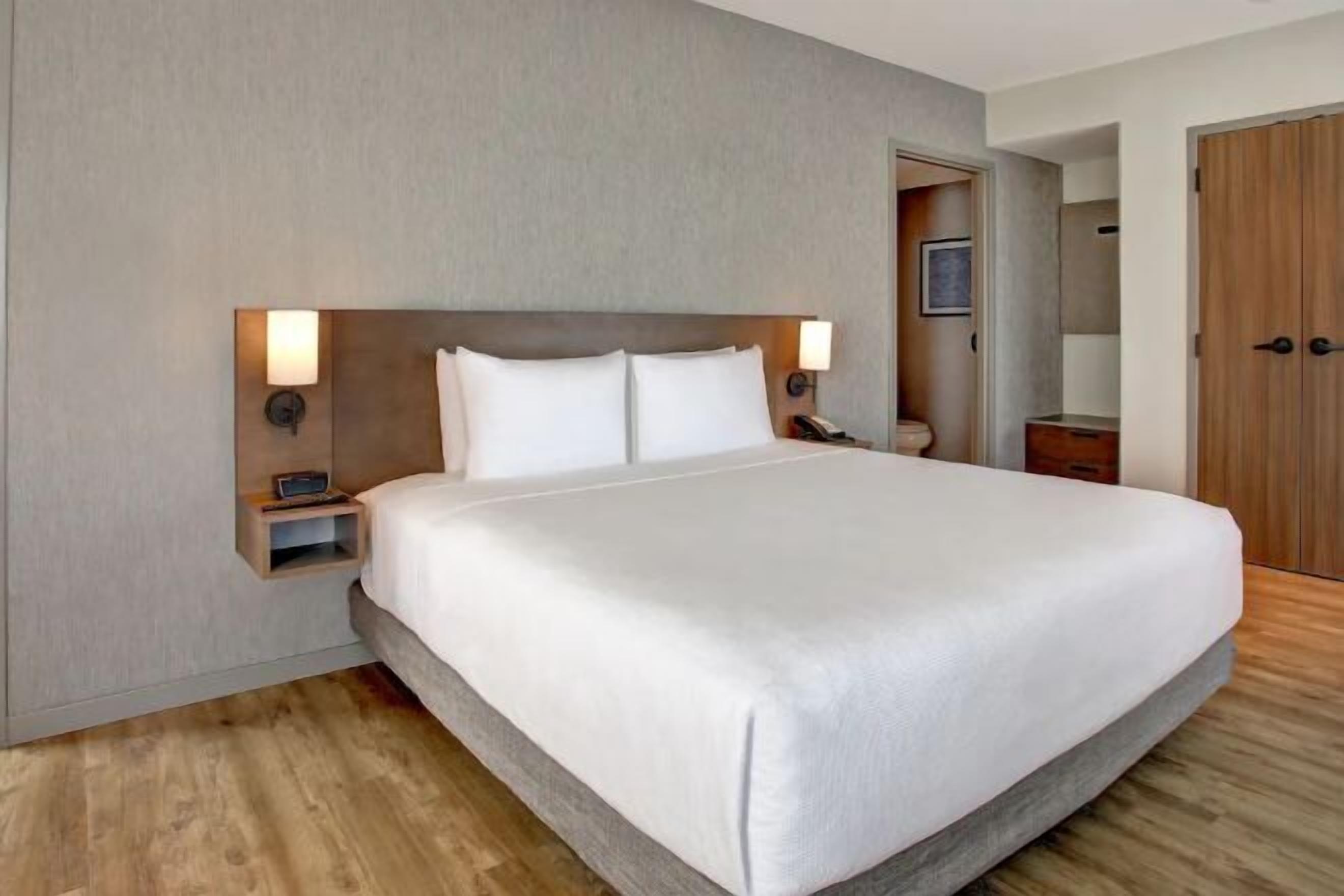 Hypo-allergenic bedding, pillow-top beds, in-room safe, desk