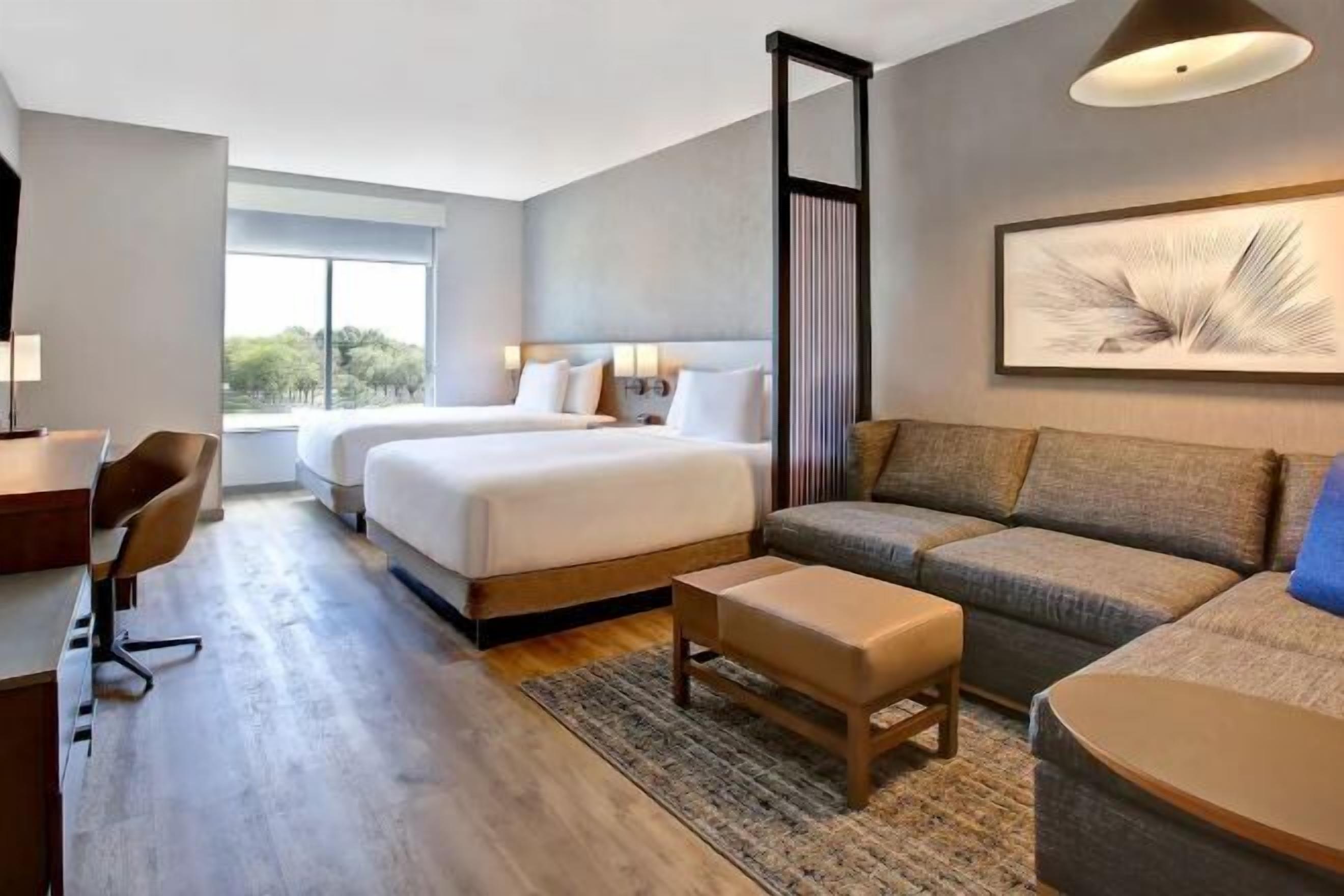 Hypo-allergenic bedding, pillow-top beds, in-room safe, desk