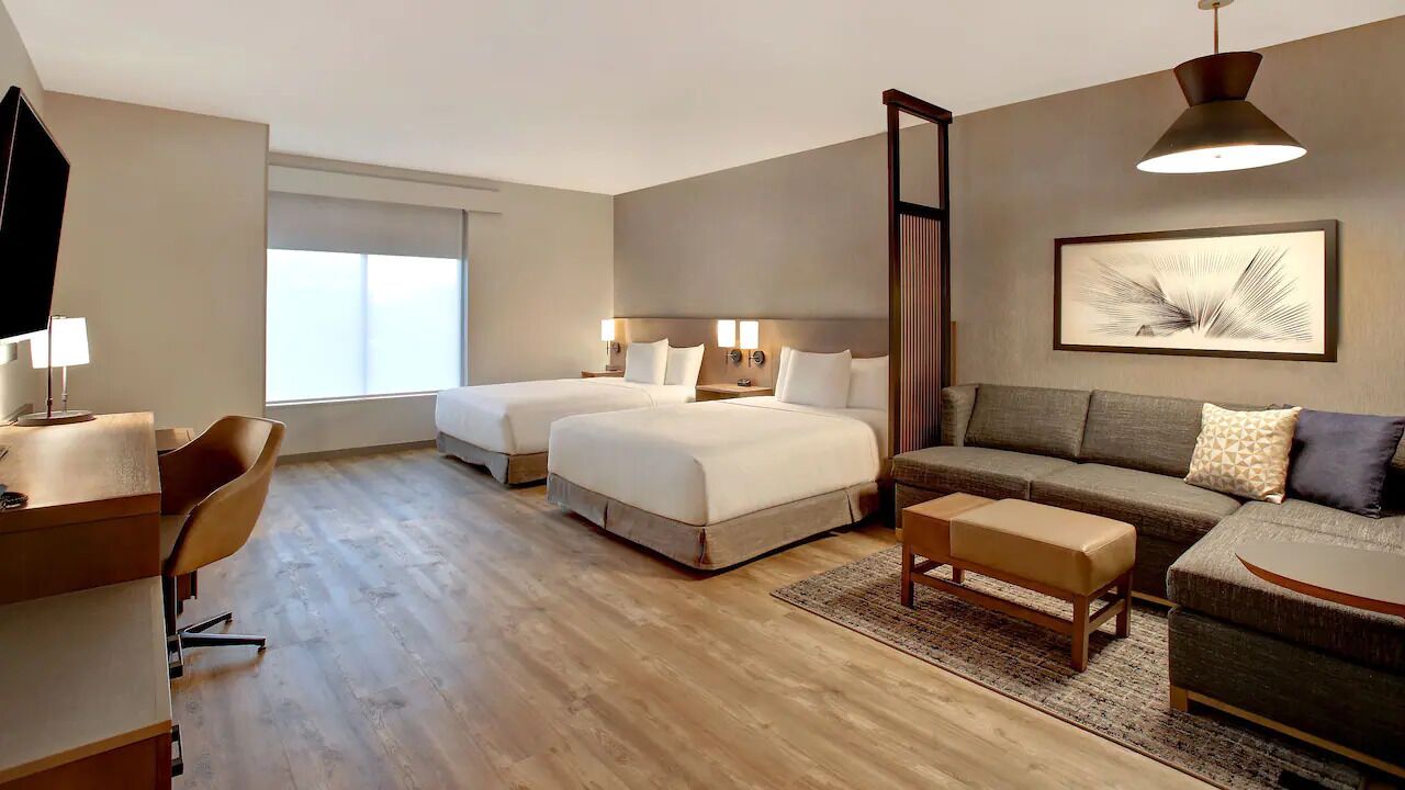 Hypo-allergenic bedding, pillow-top beds, in-room safe, desk