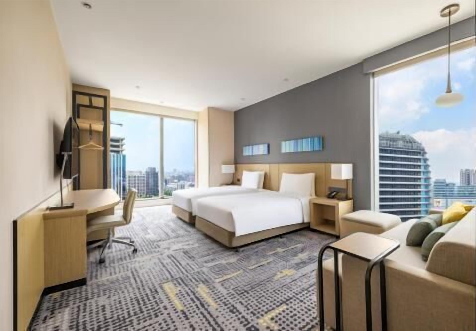 Hypo-allergenic bedding, down duvets, in-room safe, desk