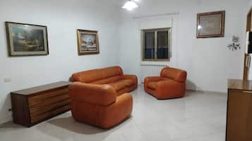 Traditional House, Non Smoking, City View | Living area | Flat-screen TV