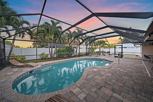 Welcome to Just Beachy- Your own private backyard oasis with a heated pool (seasonally), fire pit, lounge area, and more!