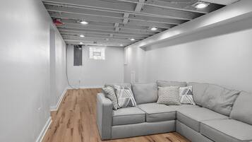 Smart TV, fireplace, foosball, books