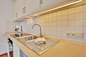 Refrigerador, horno, parrilla de estufa y lavavajillas
