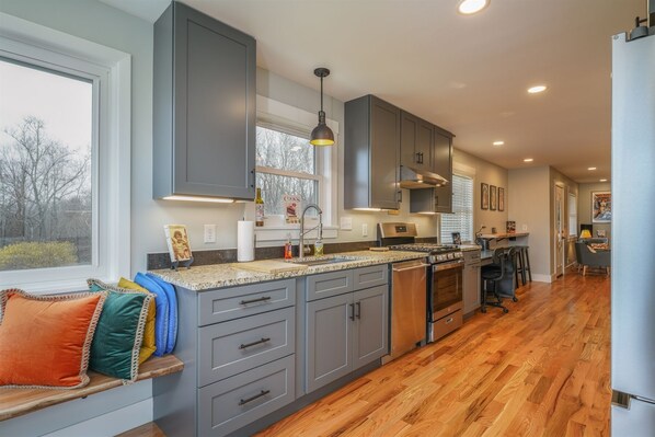 Fridge, microwave, oven, stovetop - JB's Place - custom home with 2 kitchens (Brevard)