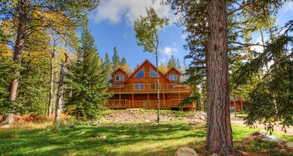 Custom log lodge with private hot tub, gorgeous decks, game room & fireplaces