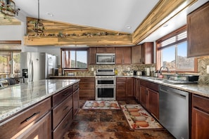 Refrigerador, microondas, horno y parrilla de estufa 