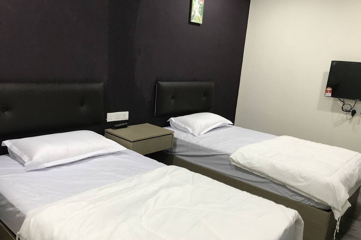 Habitación estándar con 2 camas individuales | Wifi gratis y ropa de cama