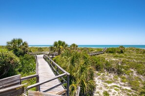 Beach nearby, beach towels, surfing, motor boating