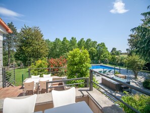 A rooftop terrace with outdoor seating, a swimming pool, and lush greenery. - Large 7 Bedrms villa in Spain, near Barcelona &15min beaches Private pool (sils)