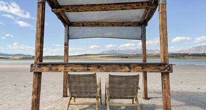 King Bed-Firepit-Shade-Chairs-Dark Skies