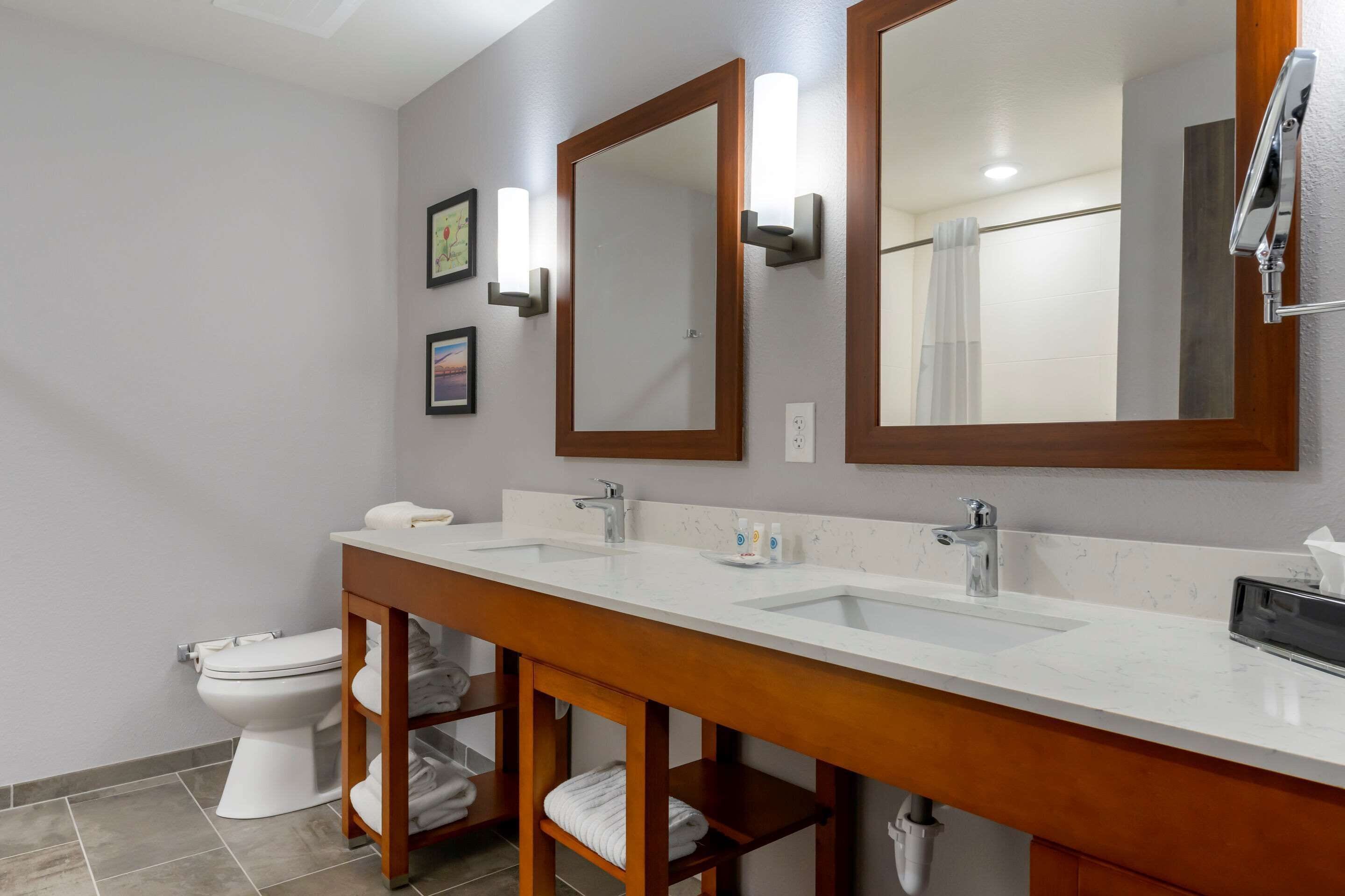 standard room, 2 queen beds, non smoking | bathroom | hair dryer, towels, soap, shampoo