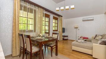 Family Apartment, 1 Bedroom, Balcony, Mountainside (Pool Villa Silva Marija - App 206) | Living area | 21-inch flat-screen TV with digital channels, TV, stereo