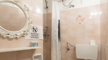 Combined shower/bathtub, hair dryer, towels, soap