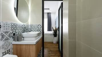 Standard Apartment | Bathroom | Shower, hair dryer, towels, soap