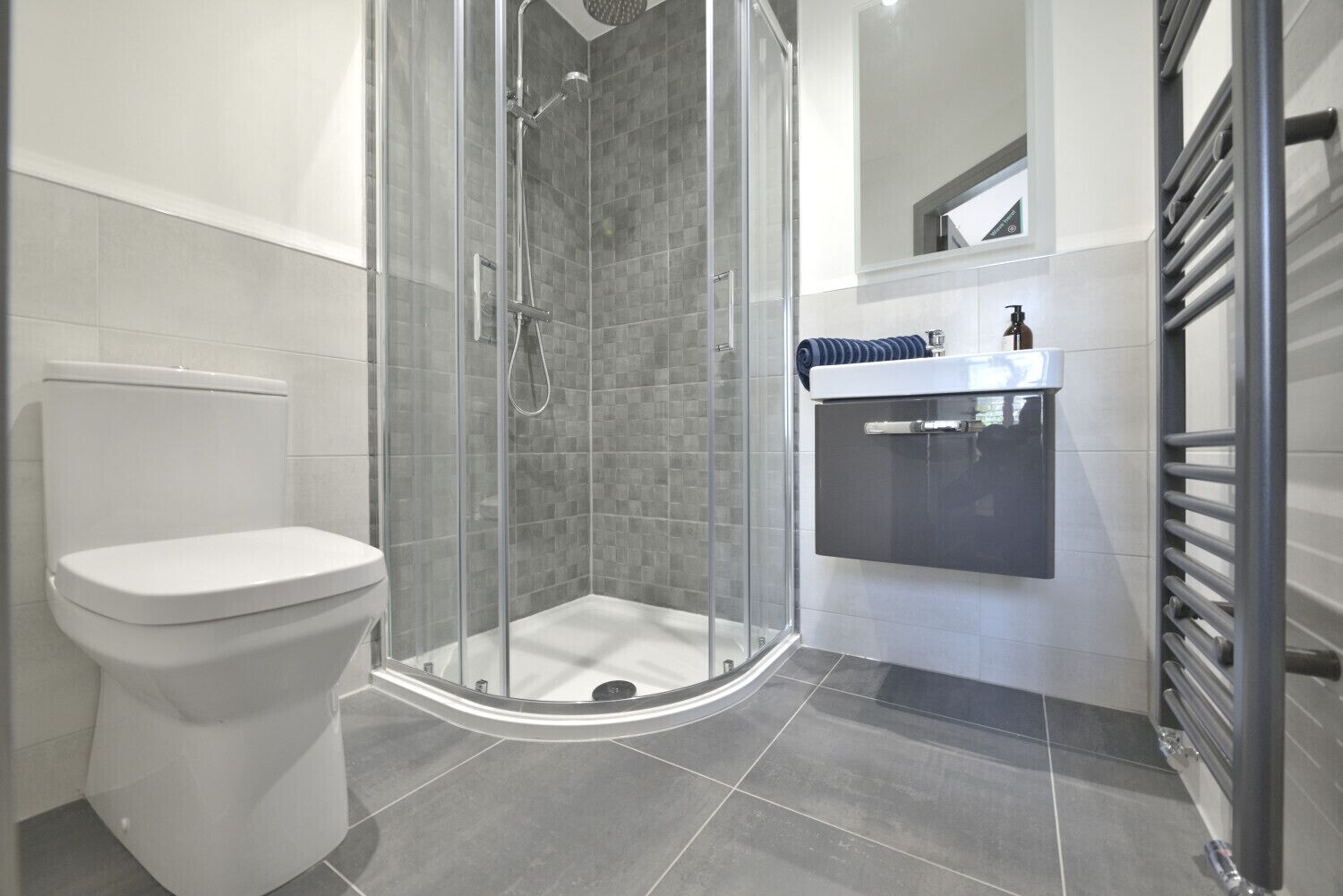 Bathtub, hair dryer, bathrobes, slippers