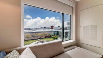 Standard Room, 2 Queen Beds, Non Smoking | In-room safe, desk, laptop workspace, blackout drapes