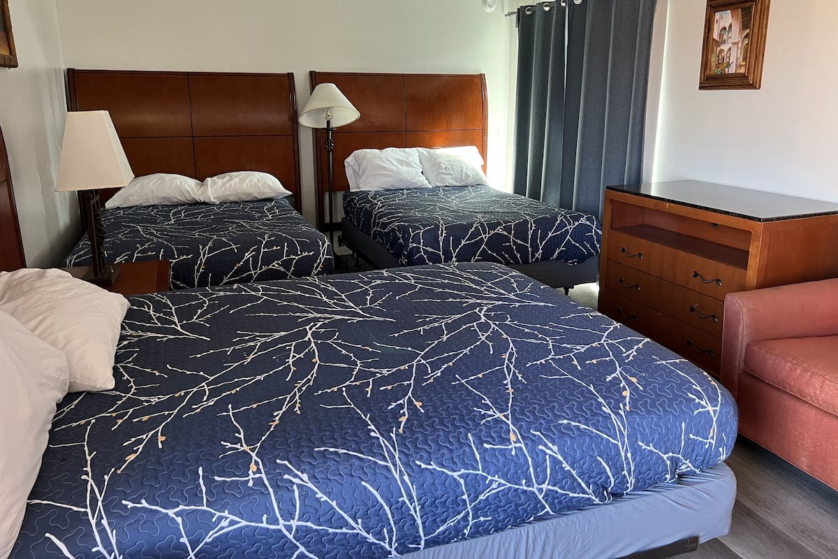 Desk, laptop workspace, free WiFi, bed sheets