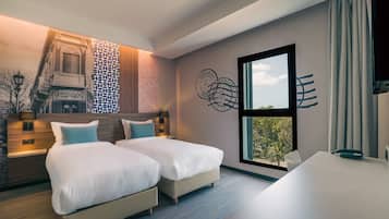 Ropa de cama de alta calidad, minibar y escritorio