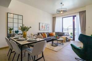 Design Apartment | Living area | 32-inch LCD TV with cable channels, TV