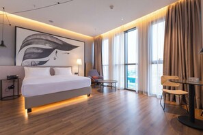 Room, 1 King Bed | Premium bedding, pillowtop beds, minibar, in-room safe