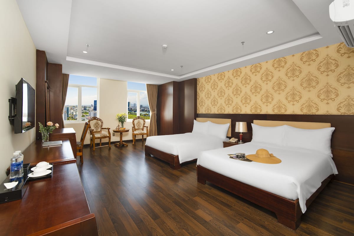 Family Room | 1 bedroom, minibar, iron/ironing board, bed sheets