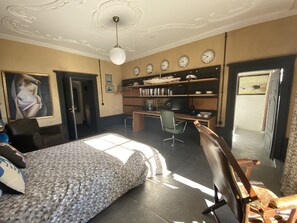 A bedroom with a bed, a desk, a chair, a bookshelf, and a painting on the wall. - Unique overnight stay in a historic castle (1635) 🏰 (Käerjeng)