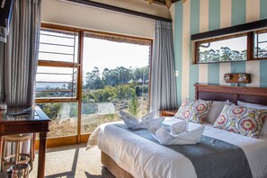 Two Bedroom Apartment with Patio | In-room safe, iron/ironing board, bed sheets