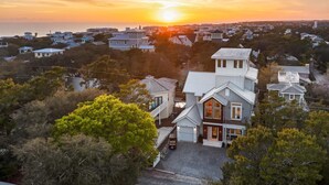 A residential area with houses during sunset. - Gulf Views, LSV, Pool and 2 Blocks to Beach (Santa Rosa Beach)