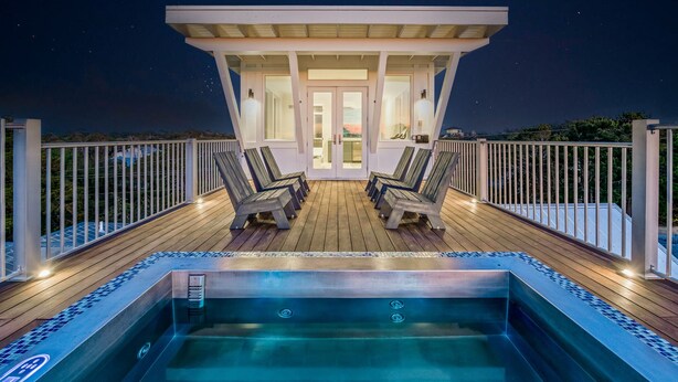 A rooftop pool area with a hot tub, lounge chairs, and a covered seating area. - Gulf Views, LSV, Pool and 2 Blocks to Beach (Santa Rosa Beach)