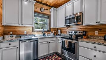 Cabin, 2 Bedrooms | Private kitchen | Fridge, microwave, stovetop, coffee/tea maker