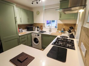Fridge, microwave, cookware/dishes/utensils