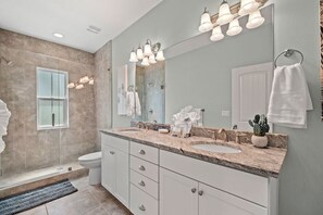 Combined shower/bathtub, hair dryer, towels, soap