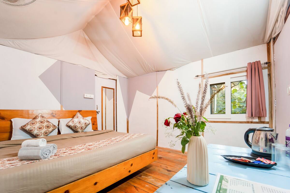 Luxury Wooden Tents with Balcony | Egyptian cotton sheets, premium bedding, desk, laptop workspace
