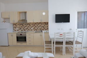 Chambre Quadruple, balcon | Cuisine privée