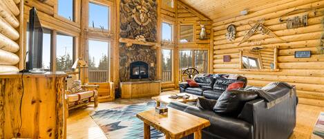 Televisión, chimenea, reproductor de DVD, futbolito