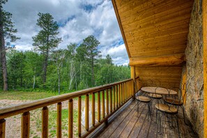 Outdoor dining - Custom cabin on 10 acres with firepit, wood stove, game room & forest views (Deadwood)
