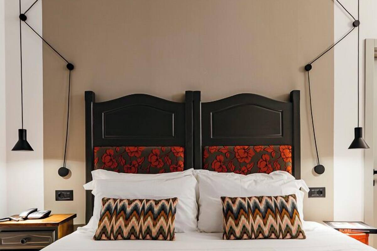 City Room | Hypo-allergenic bedding available, down comforters, pillowtop beds